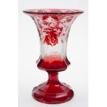 A Bohemian ruby stained glass vase: of fluted bell shape,