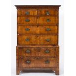 An 18th Century walnut chest on chest:, the upper part with a moulded cornice,