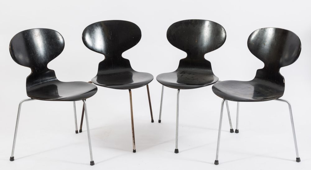 F H Danmark - A 1960's Danish rosewood circular dining table: on four grey metal splayed legs,