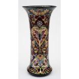 A large Moorcroft pottery vase: of waisted cylindrical form tubelined in the Tapestry of Time