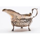 A George III silver sauce boat, maker John Langlands I, Newcastle, 1774: crested,