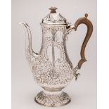 A Victorian silver coffee pot, maker SB possibly Susannah Brasted, London, 1891: crested,