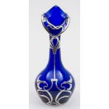 An Art Nouveau silver overlay vase: the cobalt blue body of 'organic' form with heavy silver