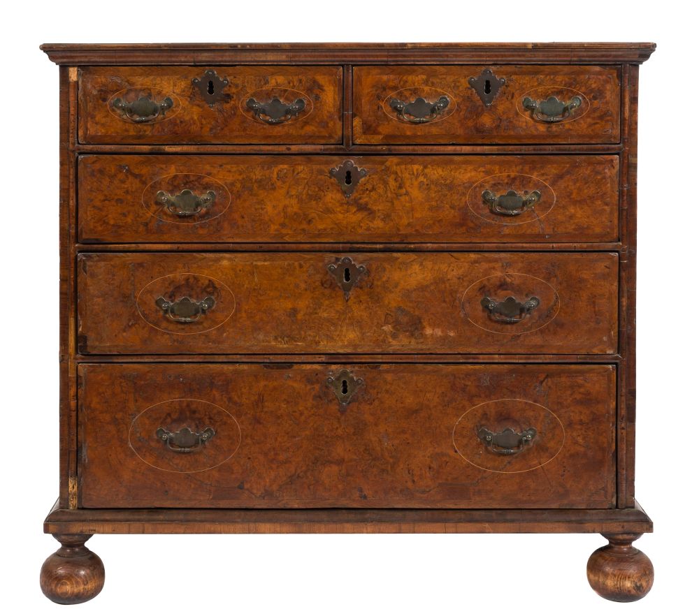 An early 18th Century walnut, inlaid and cross and feather banded rectangular chest:,