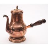 A late 18th century copper chocolate pot: of baluster form:,