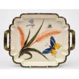 A George Jones majolica bread tray: of shaped rectangular form modelled in low relief with ears of