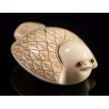 A Japanese carved ivory netsuke in the form of a sparrow: with folded wings and inset eyes, signed,