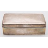 A Chinese silver cigarette box by Wang Hing, Hong Kong: inscribed, of rectangular outline,