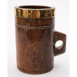 A 19th century treen and brass bound dry measure: with shaped handle,