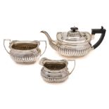 An Edward VII silver three-piece tea service, maker Thomas Hayes, Birmingham,