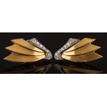 A pair of 18ct gold and diamond wing design clip stud earrings: with graduated,