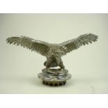 An early 20th century nickel plated Eagle car mascot:, unsigned, with outstretched wings,