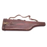 A brown leather leg o' mutton gun case:, 80cm long.