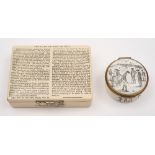 A 20th century Bilston enamel circular box and cover 'The Royal and Ancient Game of Golf' and a