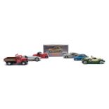 A collection of various cars and commercial vehicles:, including a Dinky Fire Engine (555),