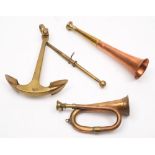 A small copper bugle,together with a copper and brass hunting horn and brass model of an anchor:,