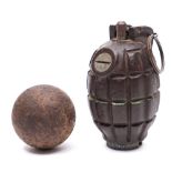 A Mk I No 36 Mills grenade together with a 1lb cannon ball:,