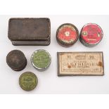 A small collection of various percussion cap tins:.
