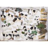 A collection of Britains farm animals and accessories:, including Blacksmith and Anvil,