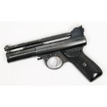 A Webley MK 1 post war air pistol:, .177 calibre with black chequered grips.