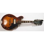 An eight string electric mandolin by Harmony:, signed to headstock as per title,