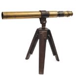 A brass gunsight telescope by Ross, London:, numbered 42539, with adjustable magnification,