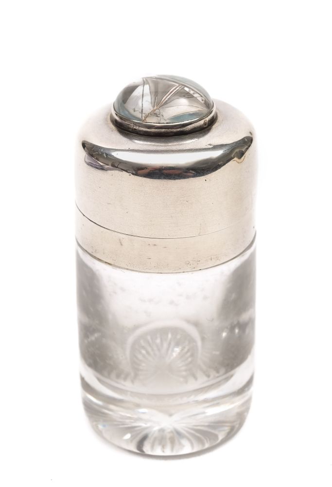 An Edwardian silver mounted smelling salts bottle with reverse painted crystal intaglio of a yacht