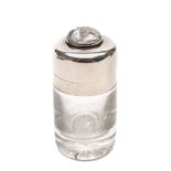 An Edwardian silver mounted smelling salts bottle with reverse painted crystal intaglio of a yacht