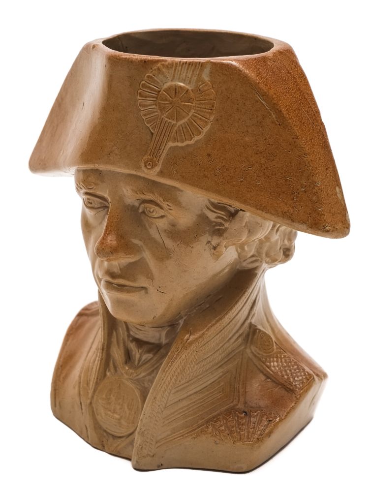 A Doulton and Watts Lambeth salt glazed stoneware jug: modelled in the form of a bust of Admiral