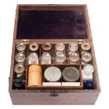 A late 19th /early 20th century mahogany medicine case:, the rectangular case with brass handle,