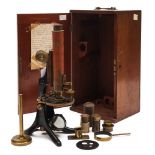 An early 20th century lacquered brass microscope:, unsigned,