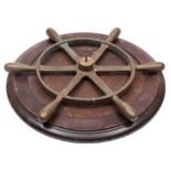 A WWII period brass ship's helm:, of plain six spoke form,