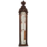 An Edwardian 'Admiral Fitzroy' pattern barometer in an oak Gothic carved case:,