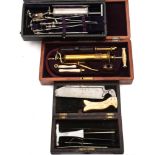 A 19th century brass enema syringe by Millikan & Lawley, London,