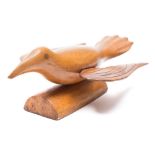 A Pitcairn Island carved wood bird:, stamped 'A souvenir form Pitcairn,