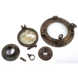 A collection of salvaged fixtures and fittings:, comprising a small bronze porthole,