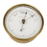 A circular brass cased barometer by Negretti & Zambra, London:,