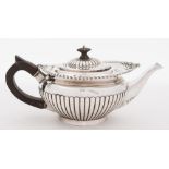 A Victorian silver teapot, maker William Hutton & Sons, London, 1896:,
