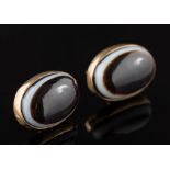 A pair of 9ct gold and oval banded agate single stone ear studs: each agate approximately 15mm long