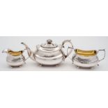 A George III silver three-piece silver tea service, maker Thomas & George Hayter, London,