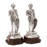 A pair of German silver figures of knights in armour, bears import marks for Adolph Barsach Davis,