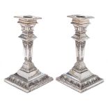 A pair of late Victorian silver candlesticks, maker John & William F Deakin, Sheffield,