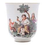 A Continental porcelain chocolate cup: with flared rim and scroll handle,