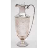 An Edward VII silver mounted and clear glass claret jug, maker Goldsmiths & Silversmiths Co Ltd,