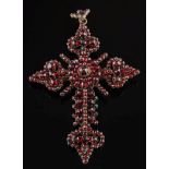 A silver and Bohemian garnet pendant 'cross': 87mm long including suspension loop.