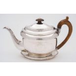 A George III silver teapot and matching stand, maker John Emes, London, 1802: initialled,
