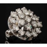 A diamond mounted circular cluster pendant brooch: with circular brilliant-cut diamonds estimated