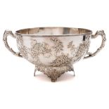 A Chinese silver bowl, maker Wang Hing, Hong Kong: of circular form with rustic handles,