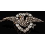 A 19th century diamond and rose diamond 'sweetheart' brooch: set with rose cut and round old