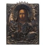 A mid 19th century Russian icon, Christ Pantocrator: oil on board encased in a silver oklad,